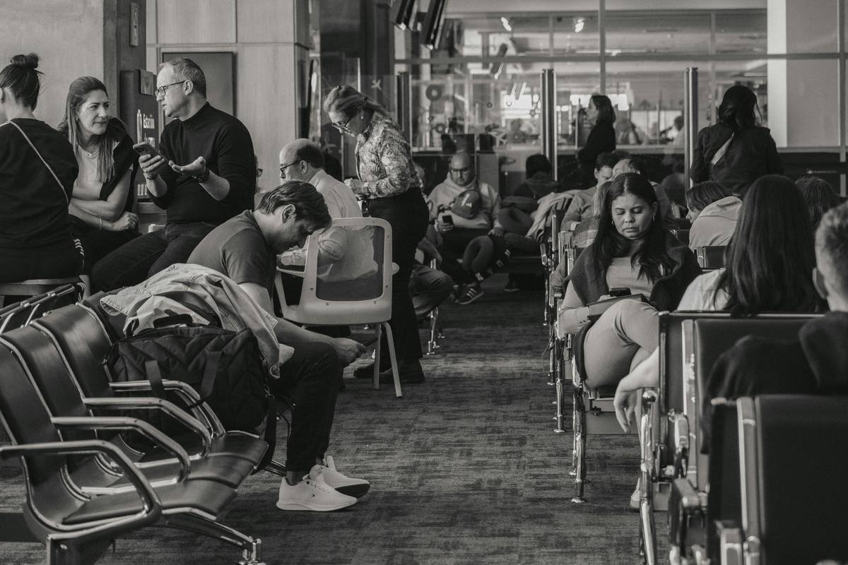 Infographic showing common causes of travel delays and costs associated