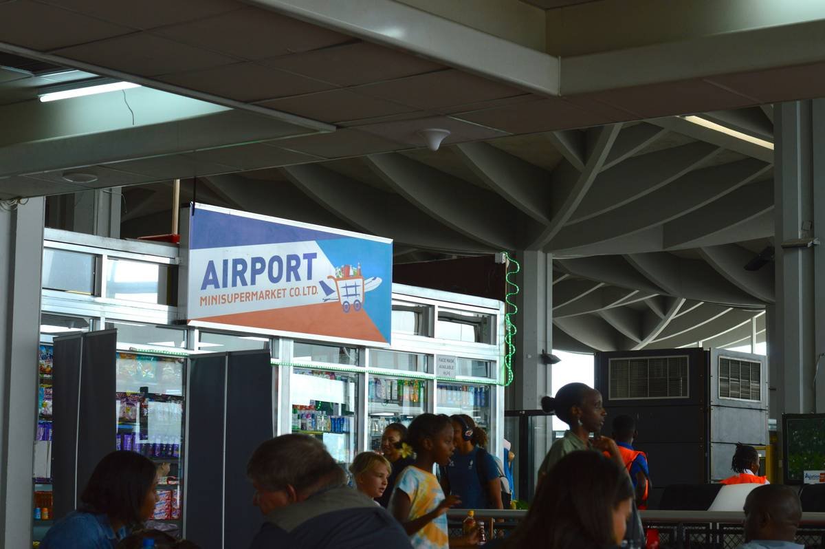 Comparison table showing free vs. paid travel delay insurance options