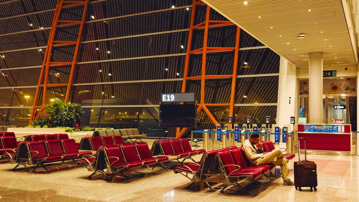 Illustration showing an airplane grounded due to stormy weather